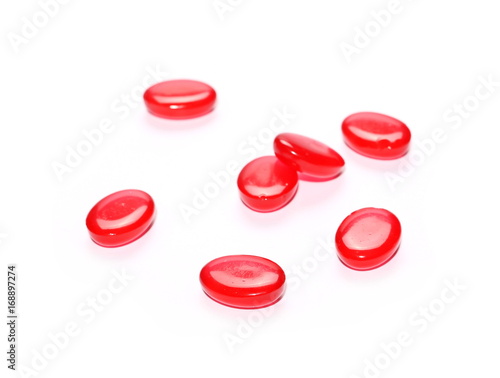 Red candies isolated on white background