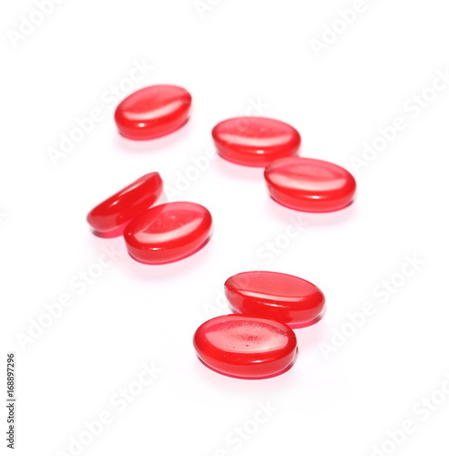 Red candies isolated on white background