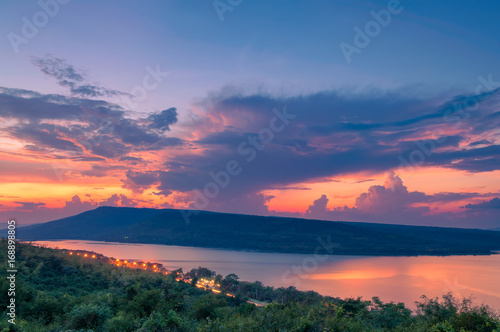 Beautiful sunset over lake at Lam Ta Khong Reservoir © Salawin Chanthapan