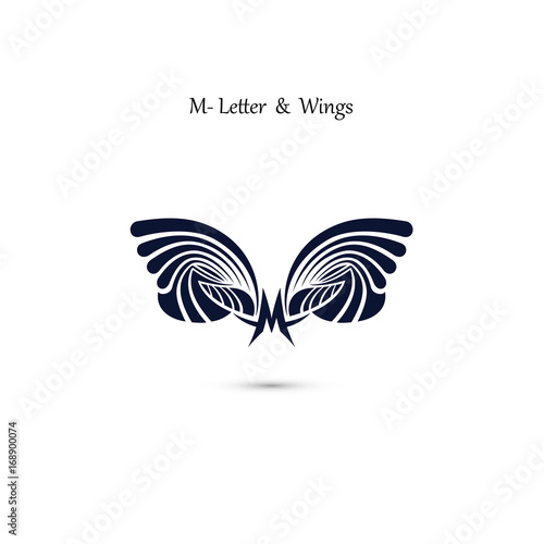 M-letter sign and angel wings.Monogram wing vector logo template.Classic emblem.