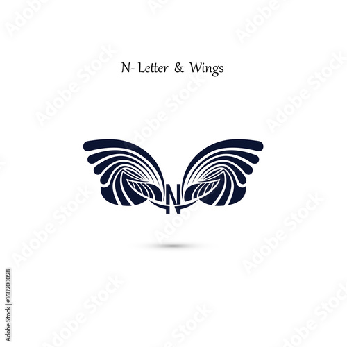 Wallpaper Mural N-letter sign and angel wings.Monogram wing vector logo template.Classic emblem. Torontodigital.ca