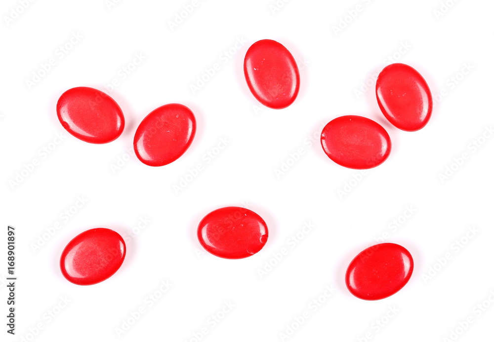 Red candies isolated on white background, top view Red candies isolated on white background, top view