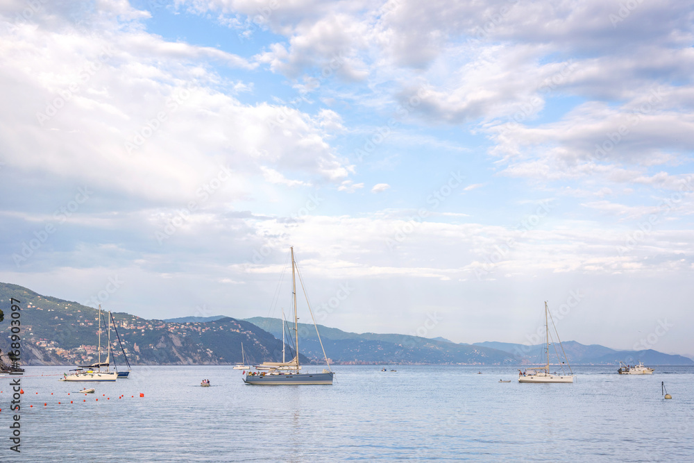 Daylight beautiful view to ships cruising on water and blue sky. Santa Margherita Ligure, Italy