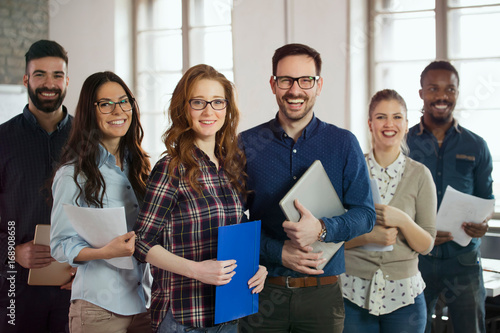 Group picture of young successful team of designers
