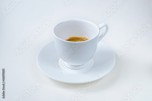 A coffee in a white pocelain cup