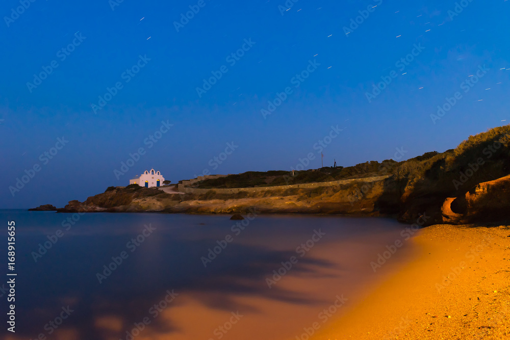 Pirgaki village with the local church at Paros island in Greece during the blue hour.
