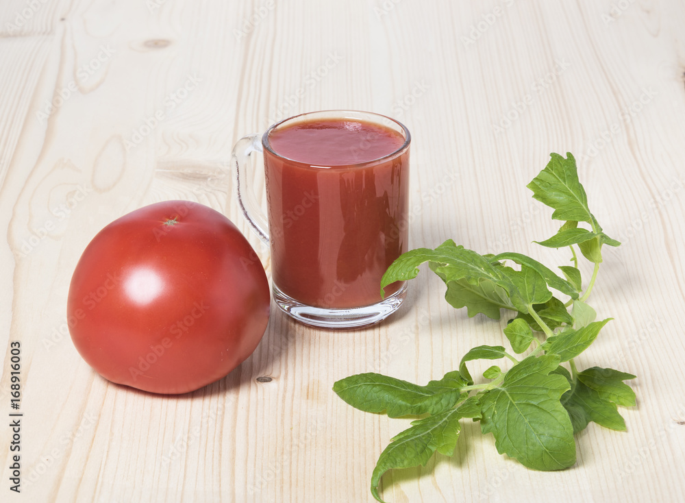 Red tomato and tomato juice