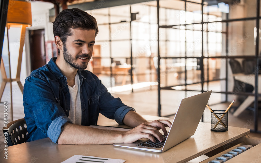 Fototapeta premium Attractive businessman working