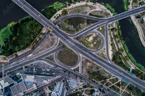 Fragment of the road junction in Kiev near the residential area of Rusanovka. Aerial view. From above