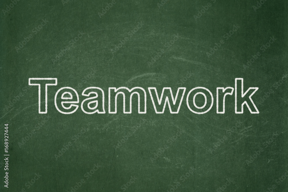 Business concept: Teamwork on chalkboard background