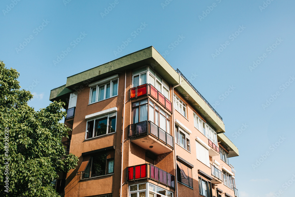 Residential building in Istanbul with balconies. Turkey. Ordinary people's life. Authentic.