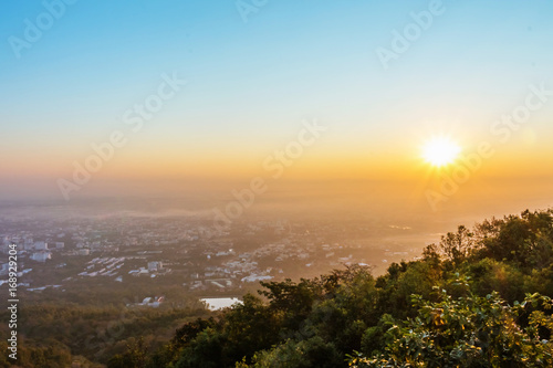 Mountain View Sunrise over Chiang Mai City, Thailand © tapui