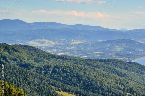 Summer mountain landscape. Beautiful green hills on a sunny day.