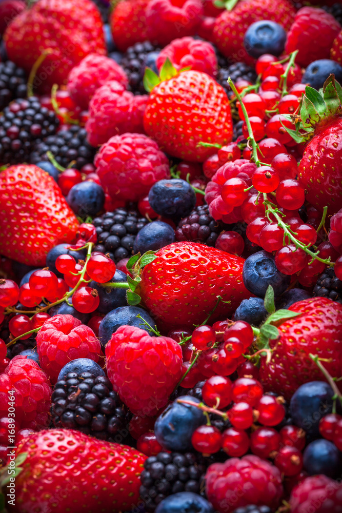 Forest fruit overhead berries assorted close up mix in studio. Raspberry, blueberry, red currant Forest fruit overhead berries assorted close up mix in studio. Raspberry, blueberry, red currant