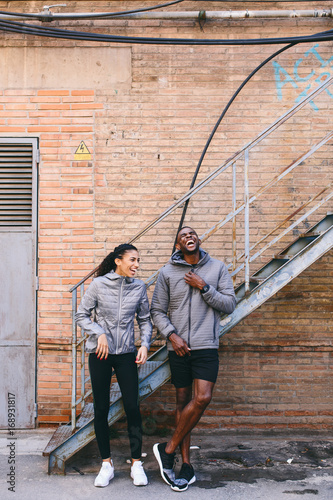 Wallpaper Mural Two runners leaning against staircase Torontodigital.ca