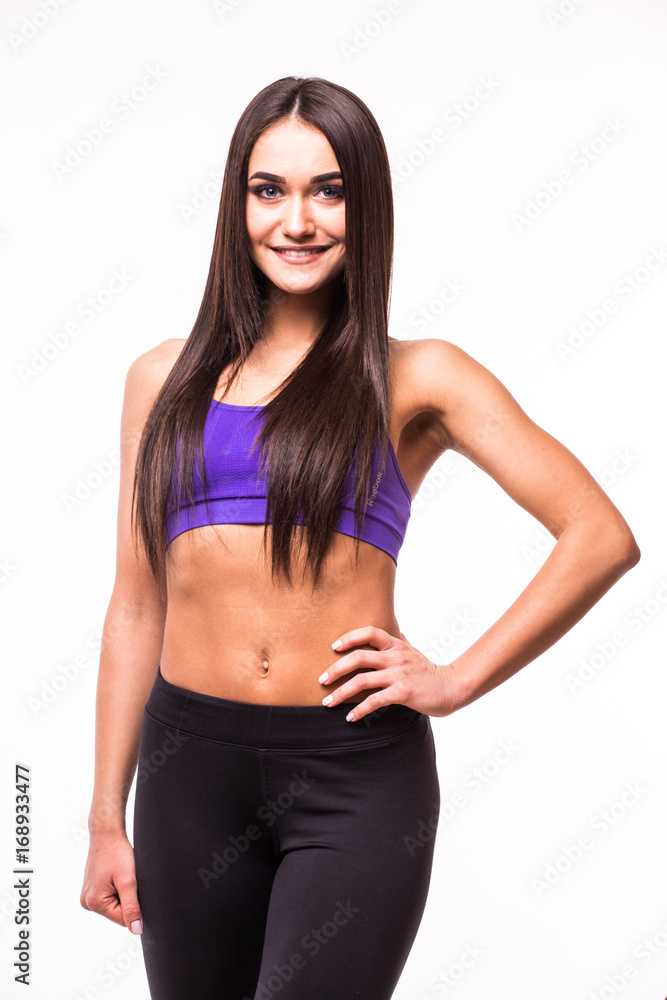 Portrait young cheerful smiling woman in sports wear, isolated over white background Portrait young cheerful smiling woman in sports wear, isolated over white background