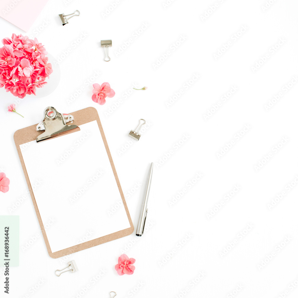 Flat lay home office desk. Clipboard with copy space for text, red flowers, accessories, mint diary on white background. Top view mock up women background. Flat lay home office desk. Clipboard with copy space for text, red flowers, accessories, mint diary on white background. Top view mock up women background.