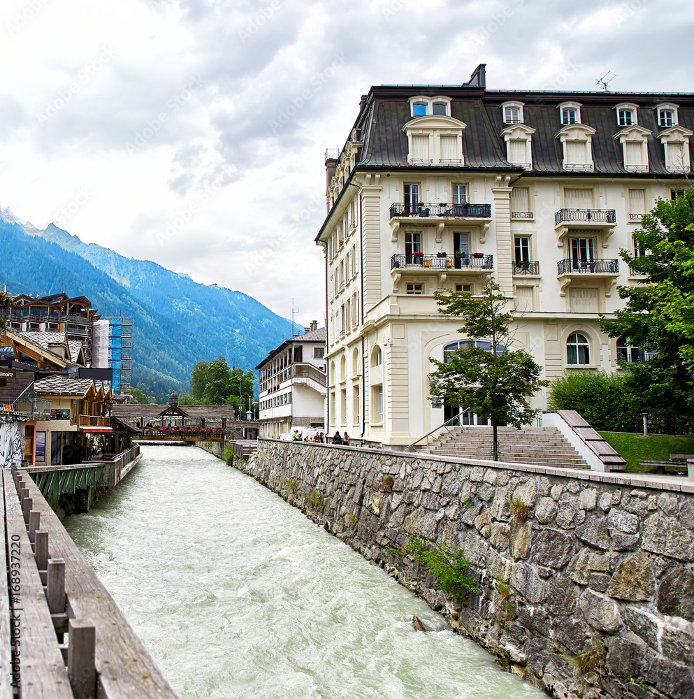 Arve river, buildings of Chamonix and Mont Blanc Massif