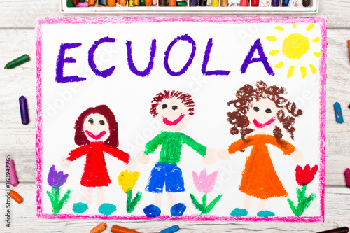 Photo of  colorful drawing: Italian word SCHOOL and happy children. First day at school.