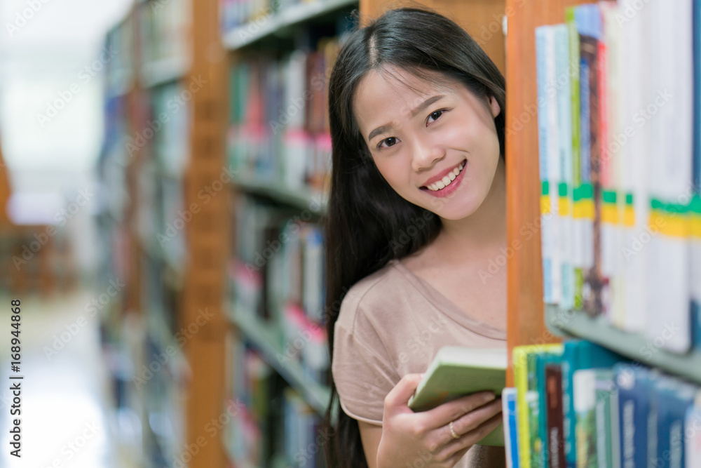 Asian students are reading book in the library Asian students are reading book in the library