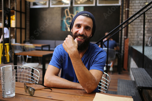 Smiling man with beard