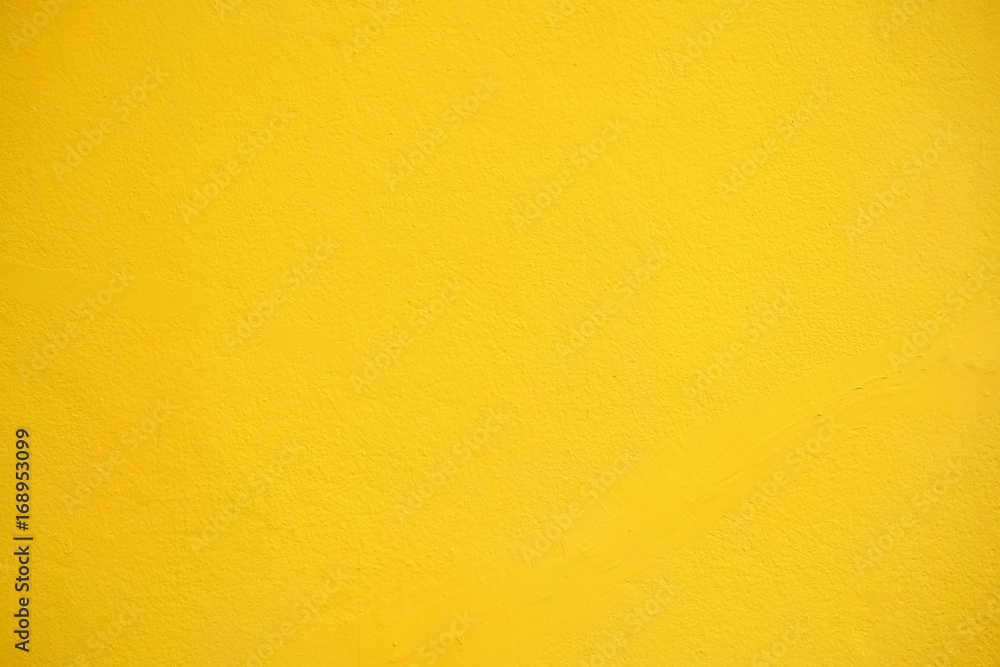 Fototapeta premium Yellow Concrete Wall Background.