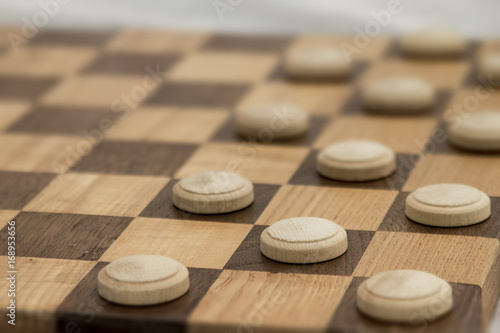 Business competition chess board concept in grainy faded old time look. Copyspace for text.