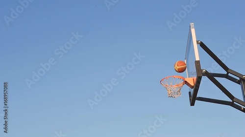 Basketball Flies Past the Basket photo