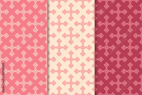 Geometric backgrounds. Set of cherry red seamless patterns