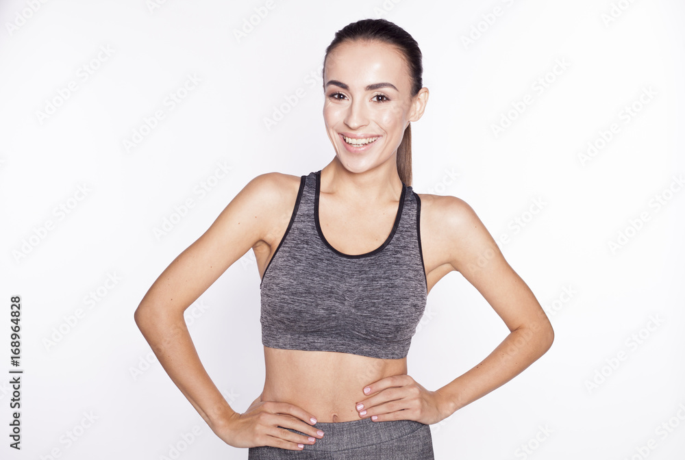 Happy Brunette sport woman After Workout isolated on white. Happy Brunette sport woman After Workout isolated on white.