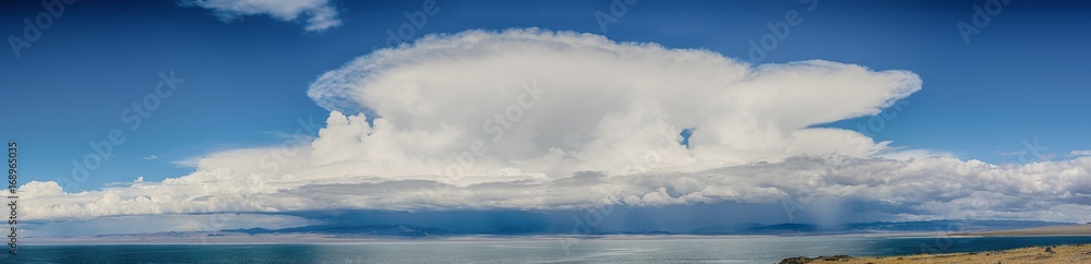 amazing fluffy white clouds in blue sky over ripple sea surface
amazing fluffy white clouds in blue sky over ripple sea surface