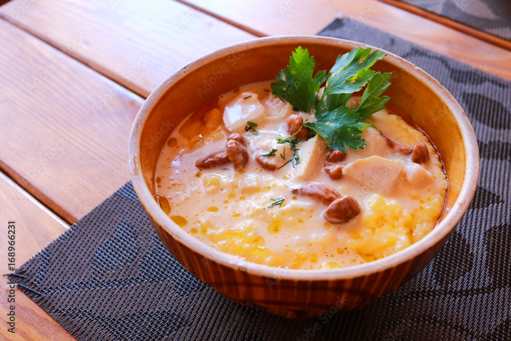 Banosh - Ukrainian Hutsul meal - maize porridge - with bacon, cracklings and cheese.