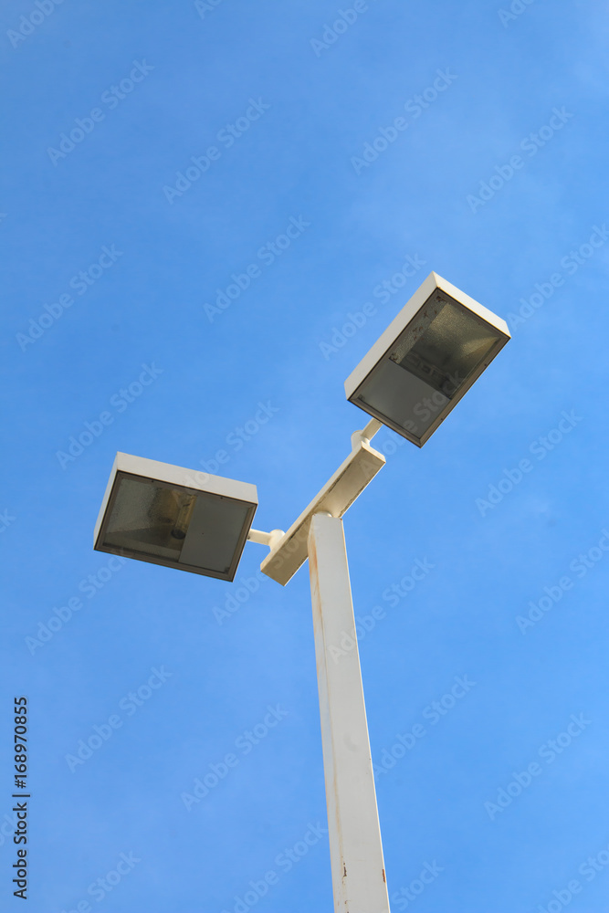 Street lamp on blue sky background. / Lamp post in Chiang Mai Thailand.