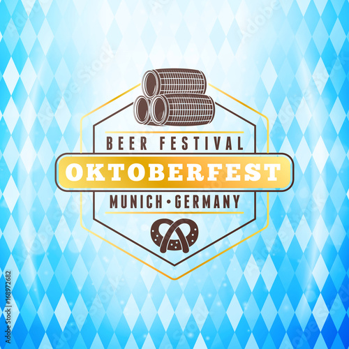 Beer festival Oktoberfest celebrations. Vintage beer badge on the traditional Bavarian flag background wuth light effect