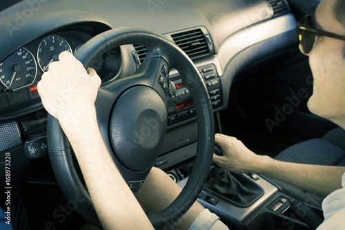 man driving car © carballo