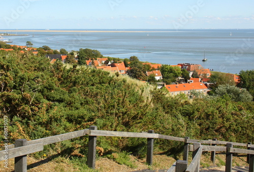 View to houses and the Waddensea from the Vuurboetsduin on the island of Vlieland. The Netherlands photo