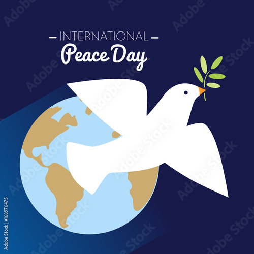 International peace day dove flying with olive branch and Earth in the background