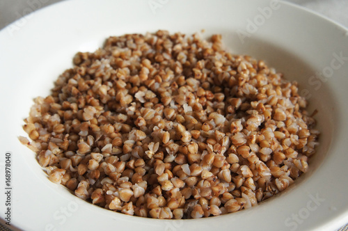 Steamed buckwheat in round plate