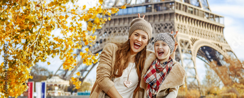 mother and child travellers having fun time in Paris, France