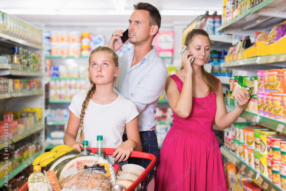 Depression small girl customer with two adult with telephones