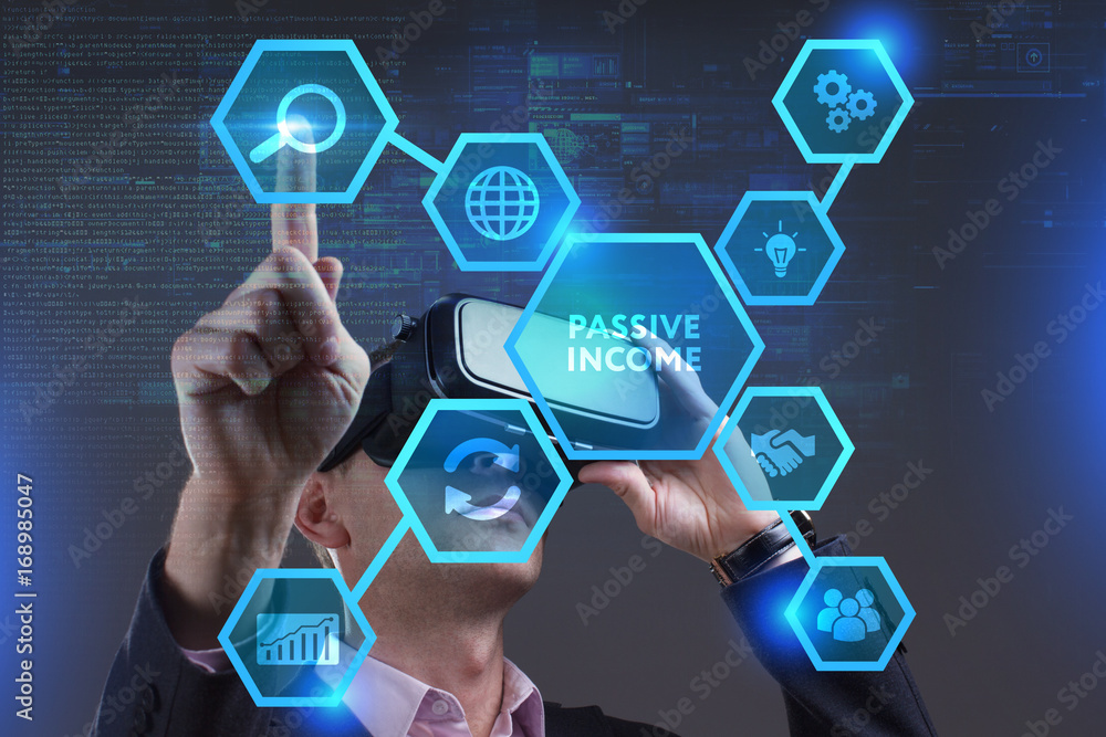 Business, Technology, Internet and network concept. Young businessman working on a virtual screen of the future and sees the inscription: Passive income Business, Technology, Internet and network concept. Young businessman working on a virtual screen of the future and sees the inscription: Passive income