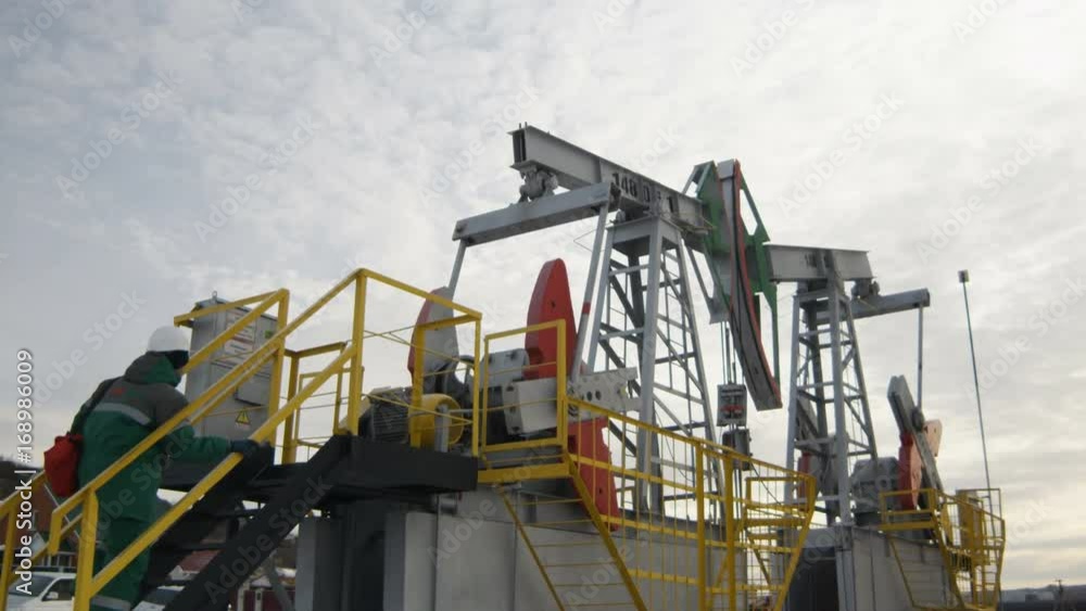 custom made wallpaper toronto digitalSlow Motion Backside View Worker Goes up to Platform on Derrick