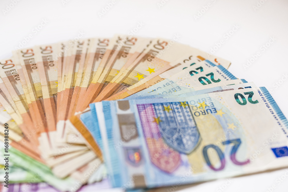 Euro cash. Many Euro banknotes of different values. Euro cash background. Euro cash. Many Euro banknotes of different values. Euro cash background.