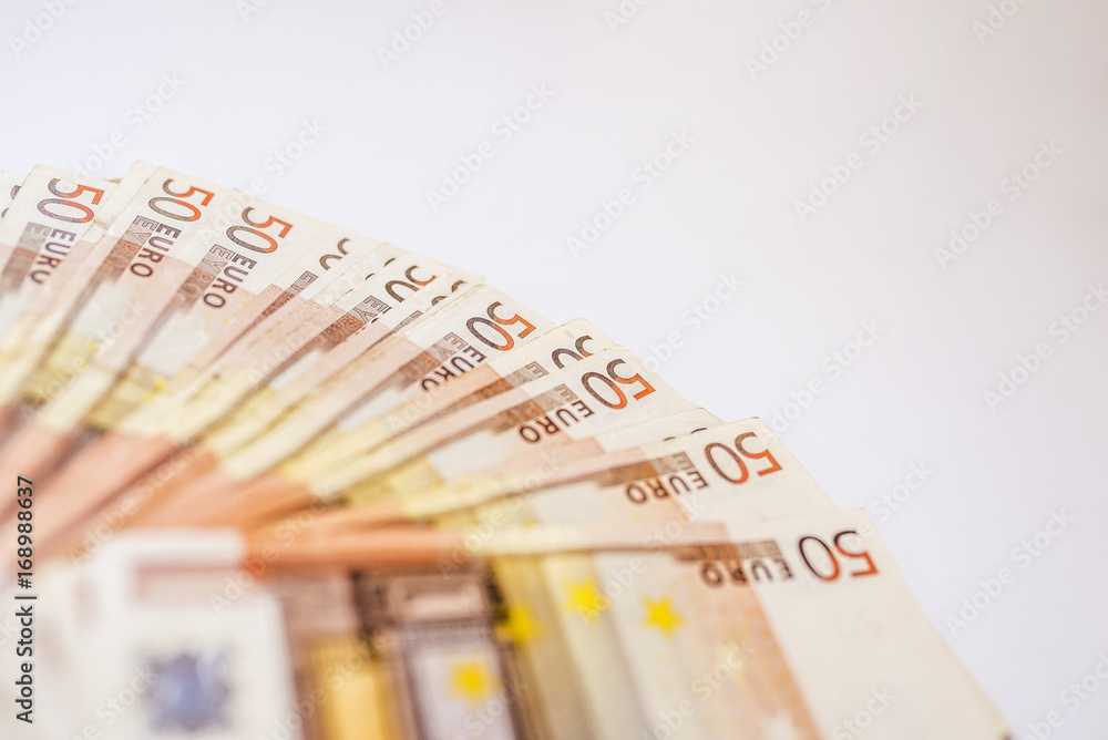 50 euro banknotes in a row. European Union Currency. Stack of 50 euro banknotes. 50 euro banknotes in a row. European Union Currency. Stack of 50 euro banknotes.