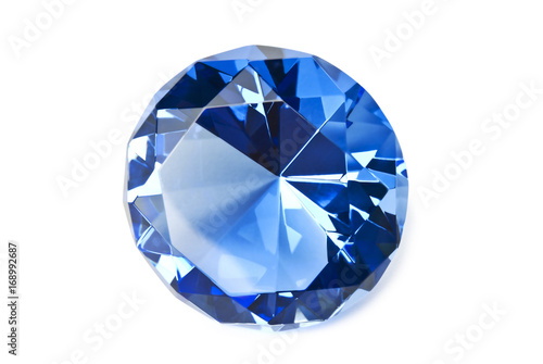 Blue gemstone isolated on white background with shadow. Clipping path included.