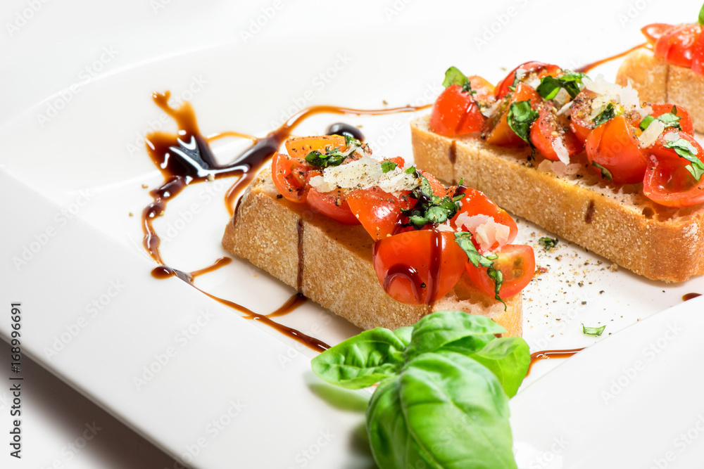 Fresh tomato basil bruschetta on toast Fresh tomato basil bruschetta on toast
