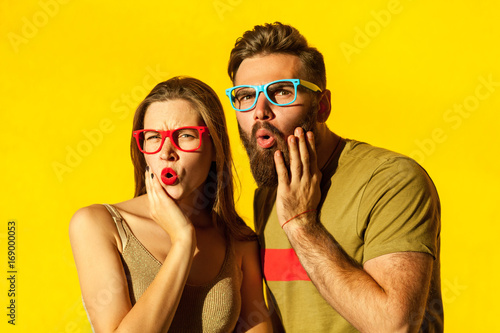 Bearded young adult man and beautiful freckled girl photo