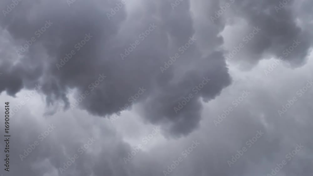 Billowing clouds of steam swirling across sky slow motion Billowing clouds of steam swirling across sky slow motion