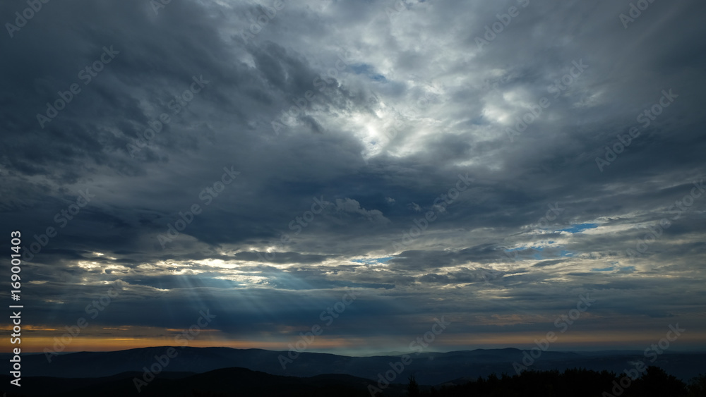 Fototapeta premium Landscape from summer sunrise with sky with dramatic clouds