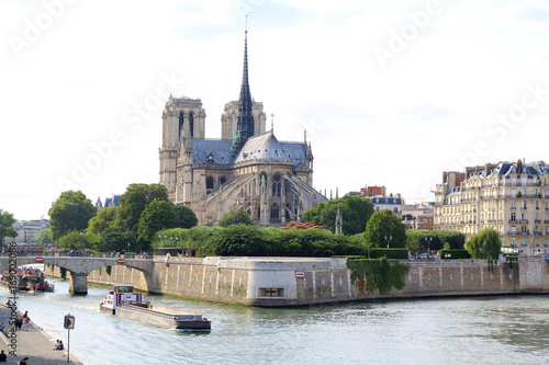 Paris, July 2017: Notre dame de paris river bay panorama. © alexmillos